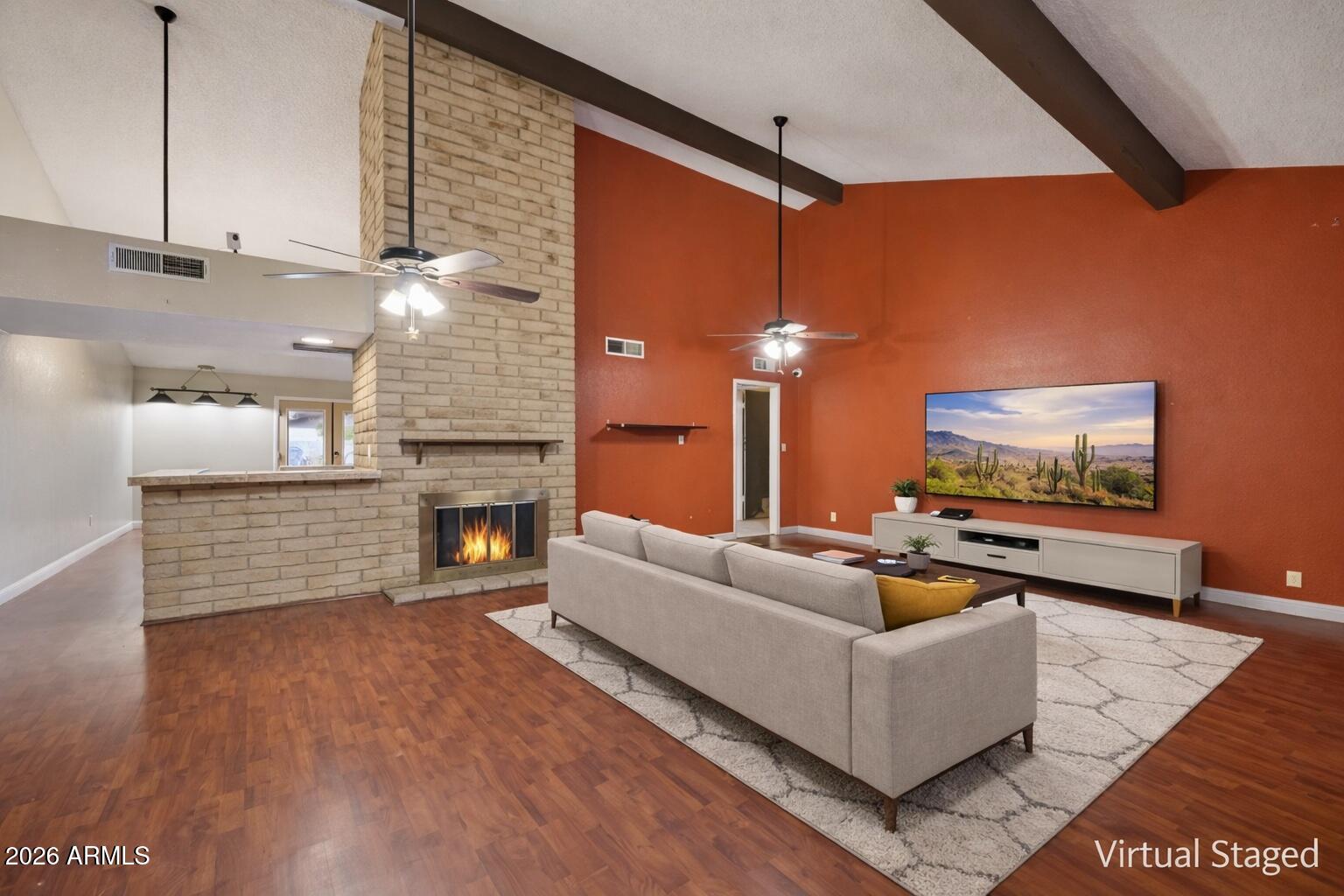 2201 West Utopia Road Phoenix, AZ 85027 - Photo 9 of 50 a living room with furniture and a fireplace
