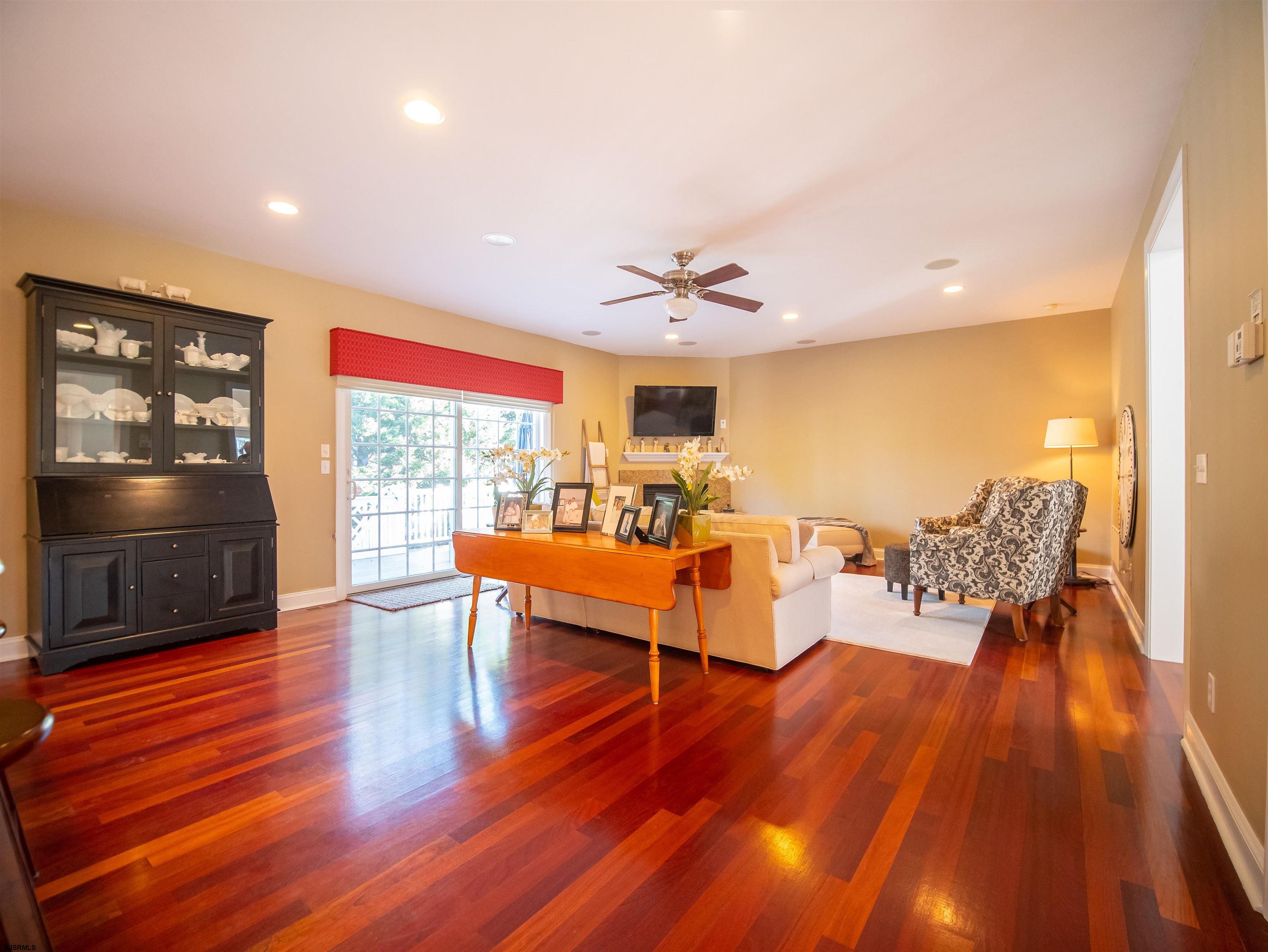 9 MGM Way Ocean View, NJ 08230 - Photo 20 of 61 a living room with furniture and wooden floor