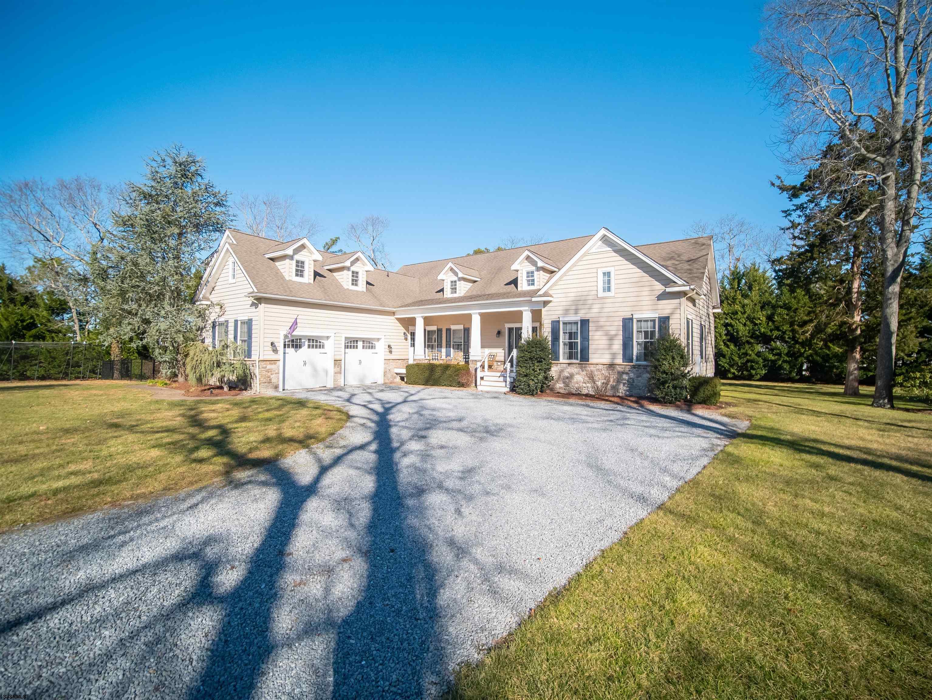 9 MGM Way Ocean View, NJ 08230 - Photo 3 of 61 a view of house with yard and ocean view