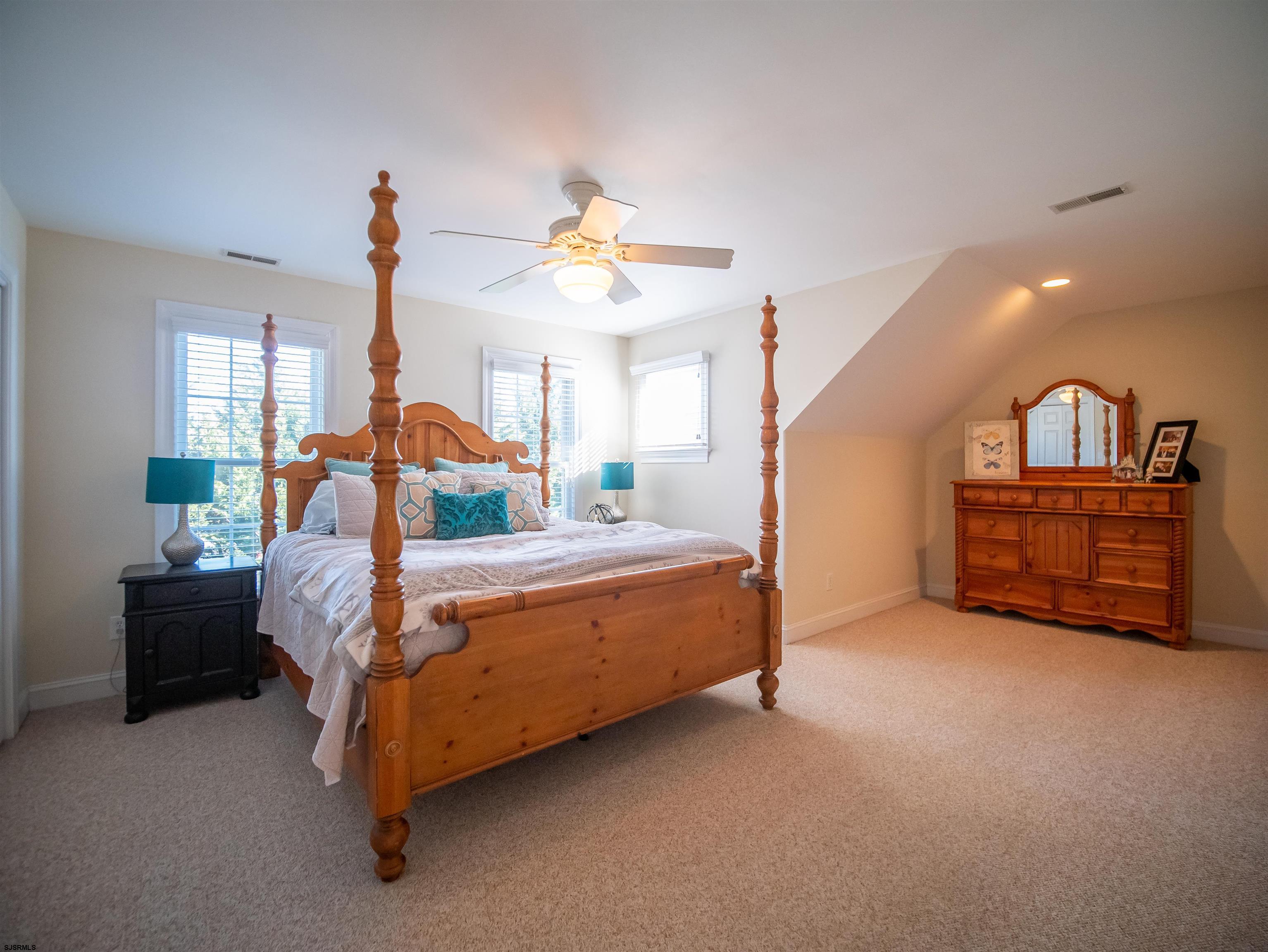 9 MGM Way Ocean View, NJ 08230 - Photo 40 of 61 a bedroom with furniture and window