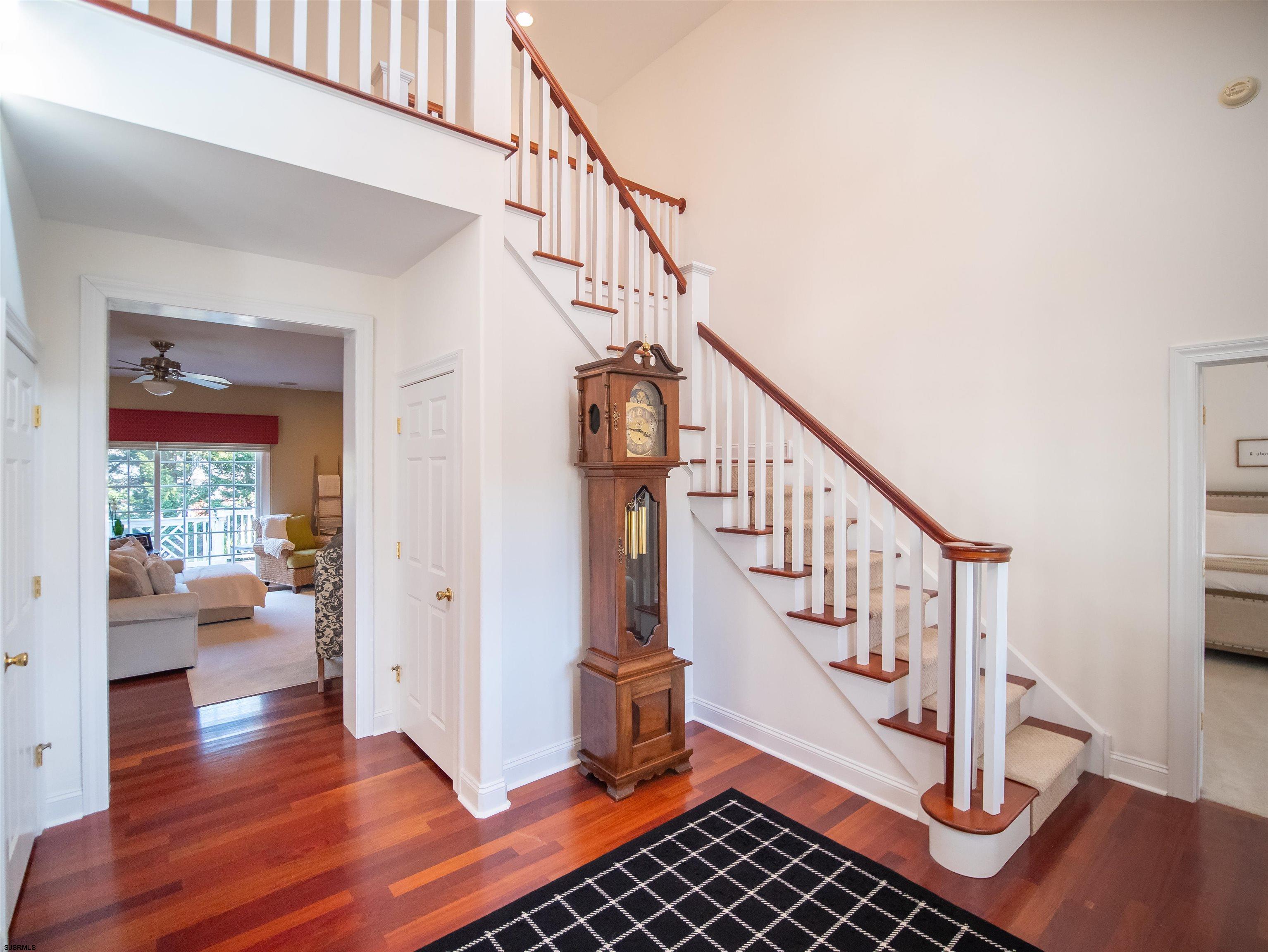 9 MGM Way Ocean View, NJ 08230 - Photo 6 of 61 a view of entryway with wooden floor and stairs
