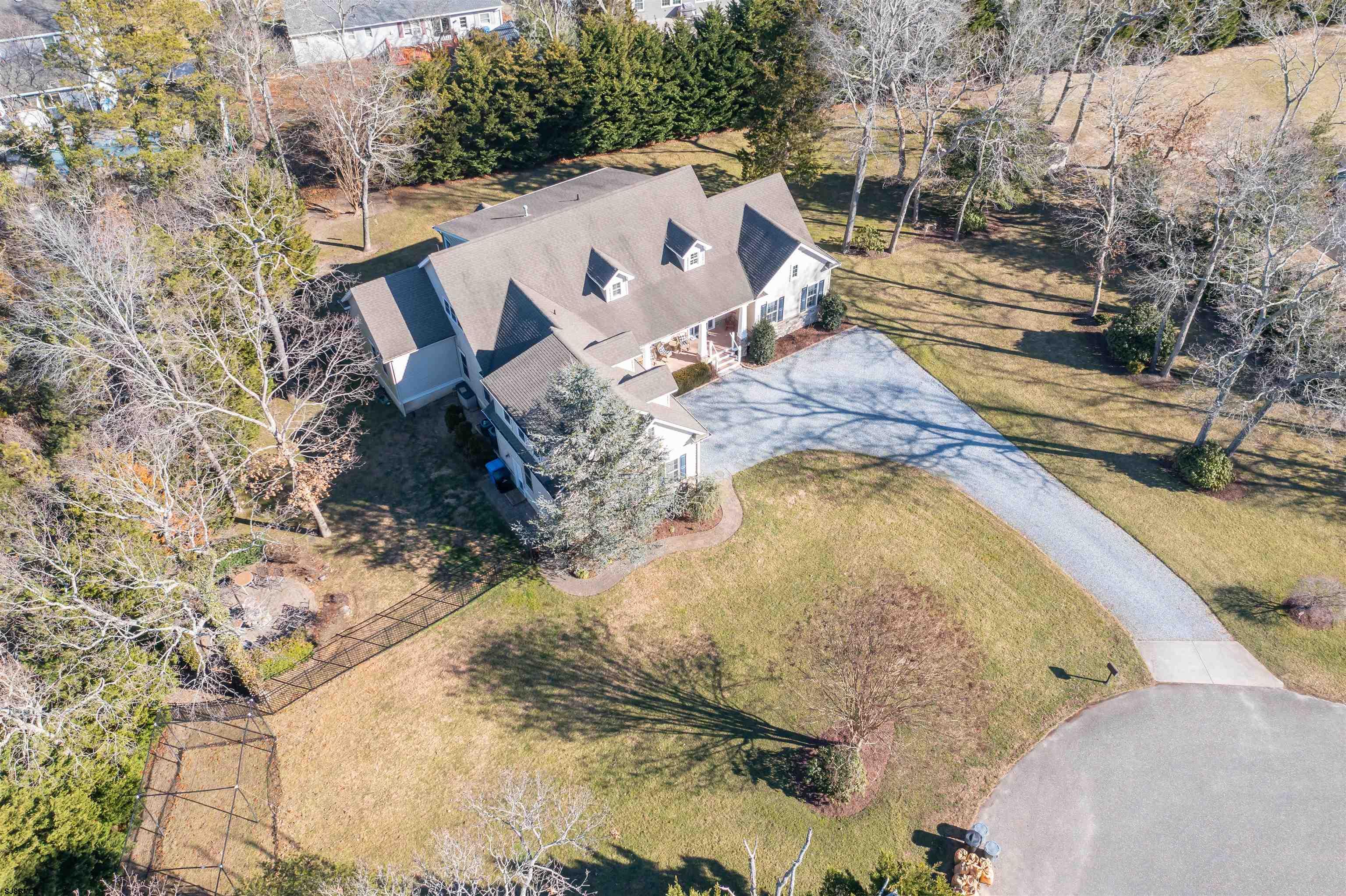 9 MGM Way Ocean View, NJ 08230 - Photo 61 of 61 a view of a swimming pool with a yard