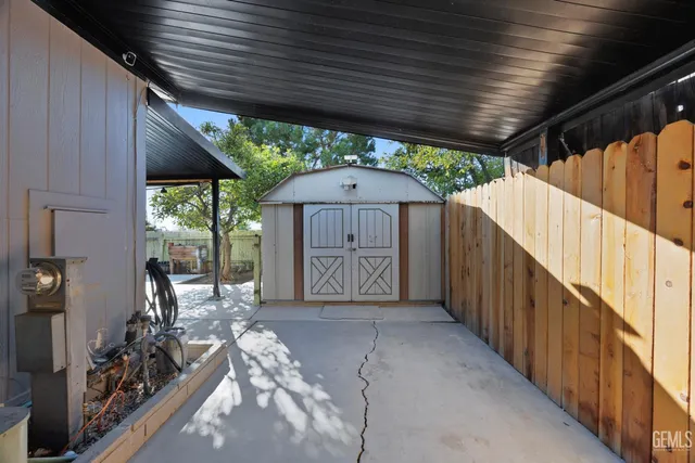 a view of a porch with wooden floor