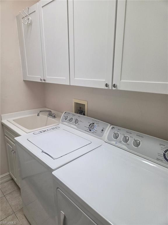 6719 Crowned Eagle Lane Naples, FL 34113 - Photo 12 of 23 a utility room with dryer and washer