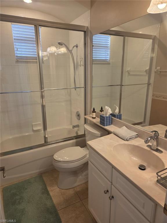 6719 Crowned Eagle Lane Naples, FL 34113 - Photo 13 of 23 a bathroom with a sink toilet and shower