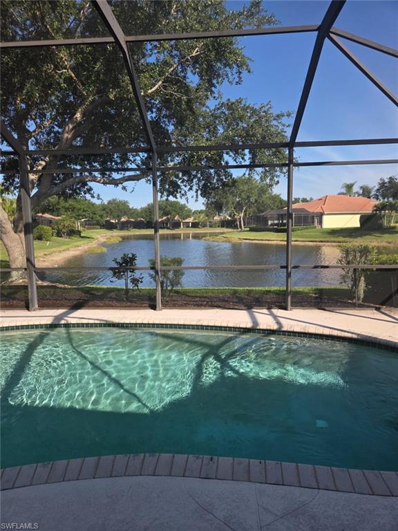 6719 Crowned Eagle Lane Naples, FL 34113 - Photo 16 of 23 a view of a yard with a tree
