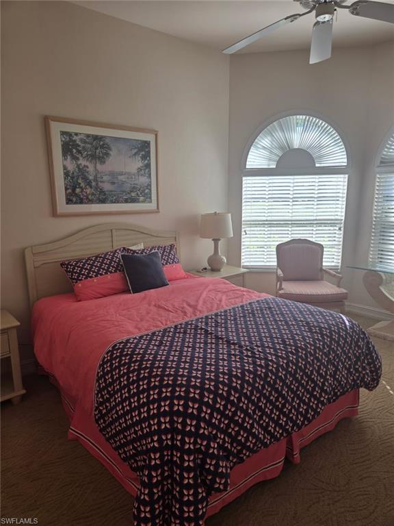 6719 Crowned Eagle Lane Naples, FL 34113 - Photo 22 of 23 a bedroom with bed and a window