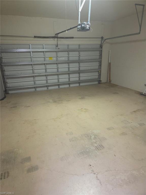 6719 Crowned Eagle Lane Naples, FL 34113 - Photo 7 of 23 a view of a store room