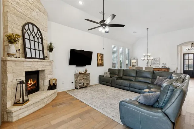 a view of kitchen island with furniture and wooden floor