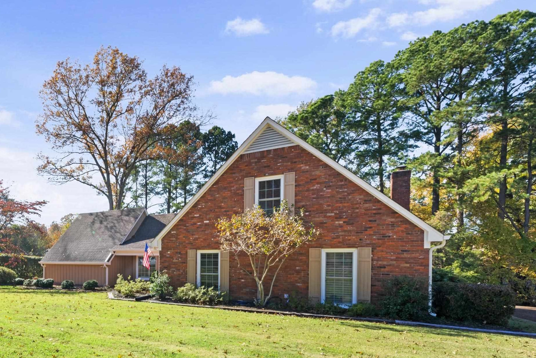 1751 Magnolia Tree Road Germantown, TN 38138 - Photo 3 of 36 a front view of a house with garden