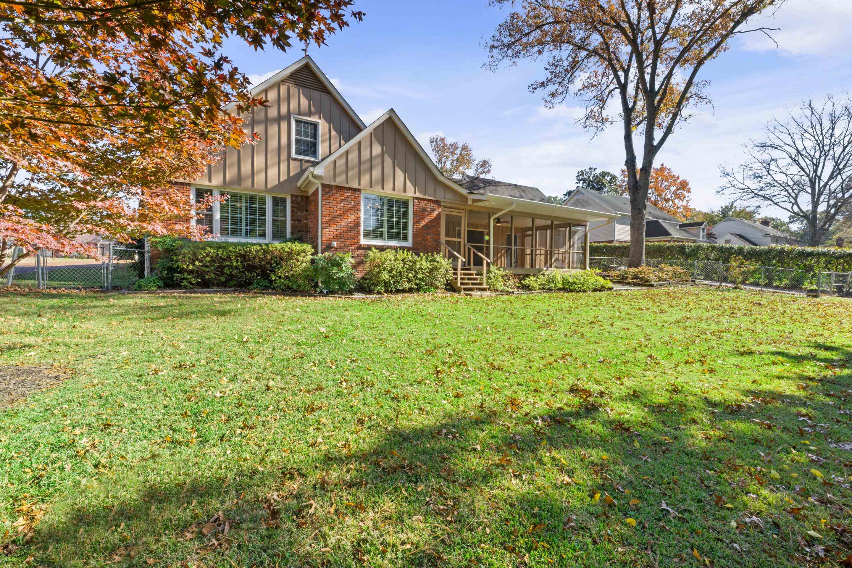 1751 Magnolia Tree Road Germantown, TN 38138 - Photo 35 of 36 a front view of a house with a yard