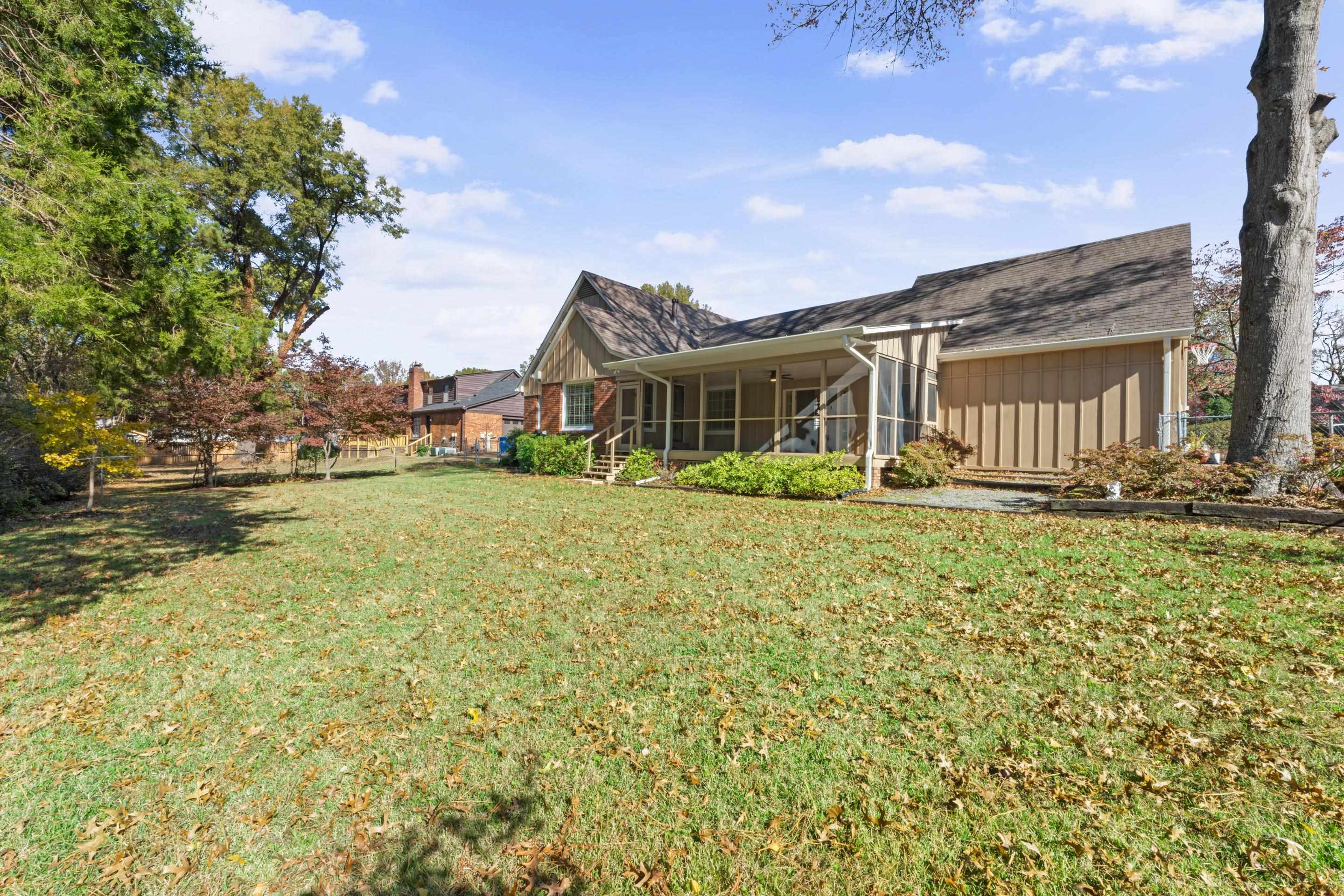 1751 Magnolia Tree Road Germantown, TN 38138 - Photo 36 of 36 a front view of a house with a yard