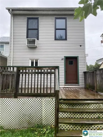 a big yard with large trees