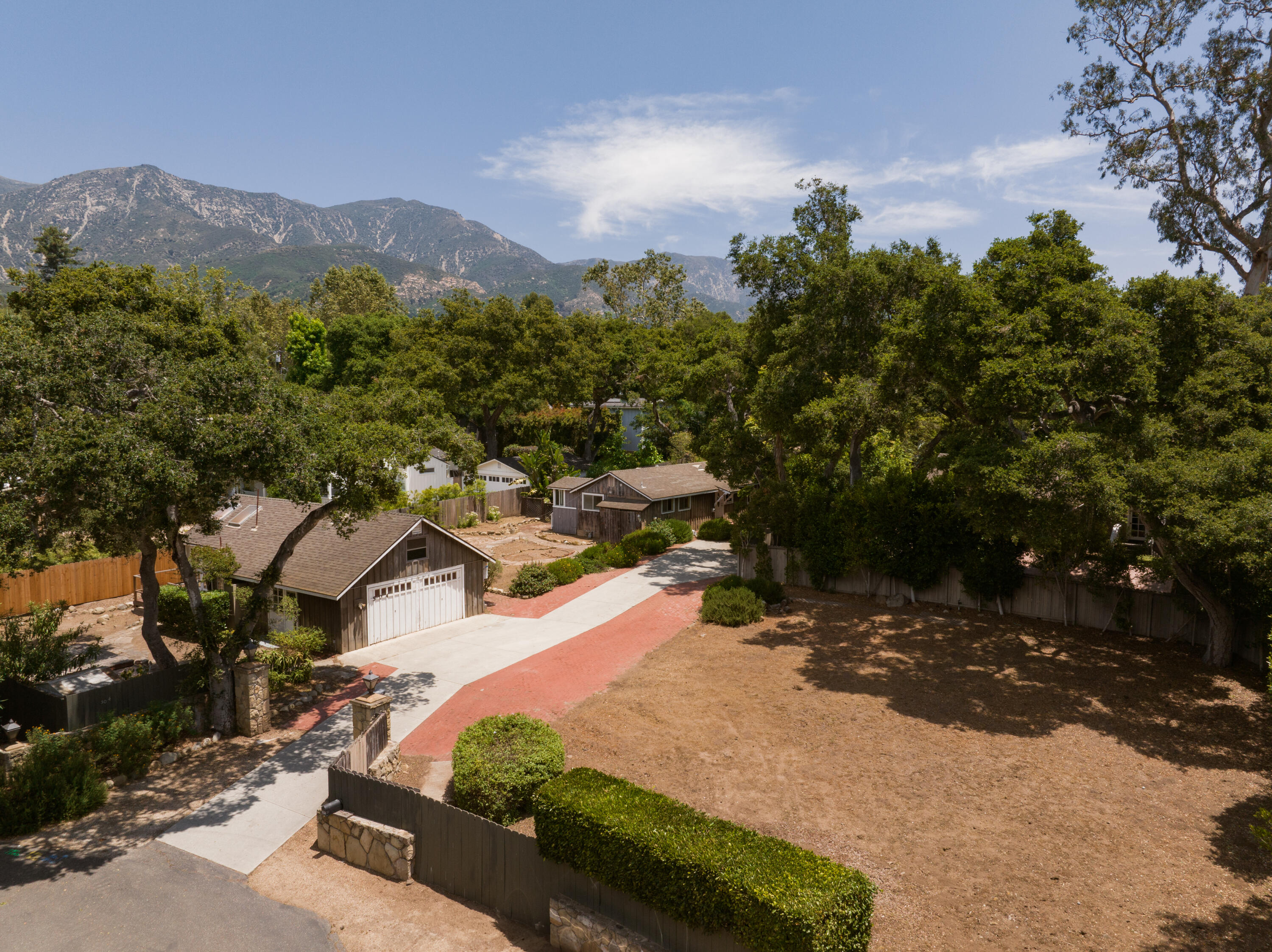 504 Hodges Lane Montecito, CA 93108 - Photo 1 of 14 a view of a town with mountains in the background
