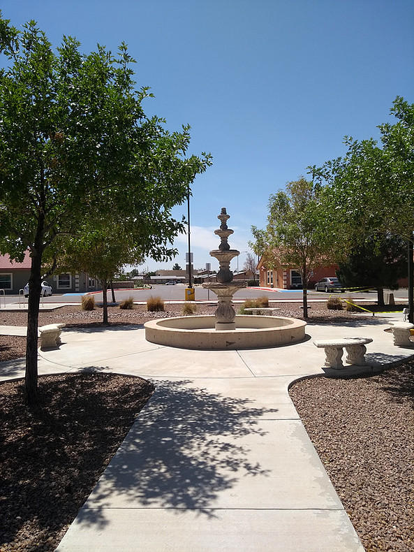 8615 San Juan Lane, Unit 1C El Paso, TX 79907 - Photo 1 of 1 a view of a swimming pool with an outdoor space and seating area