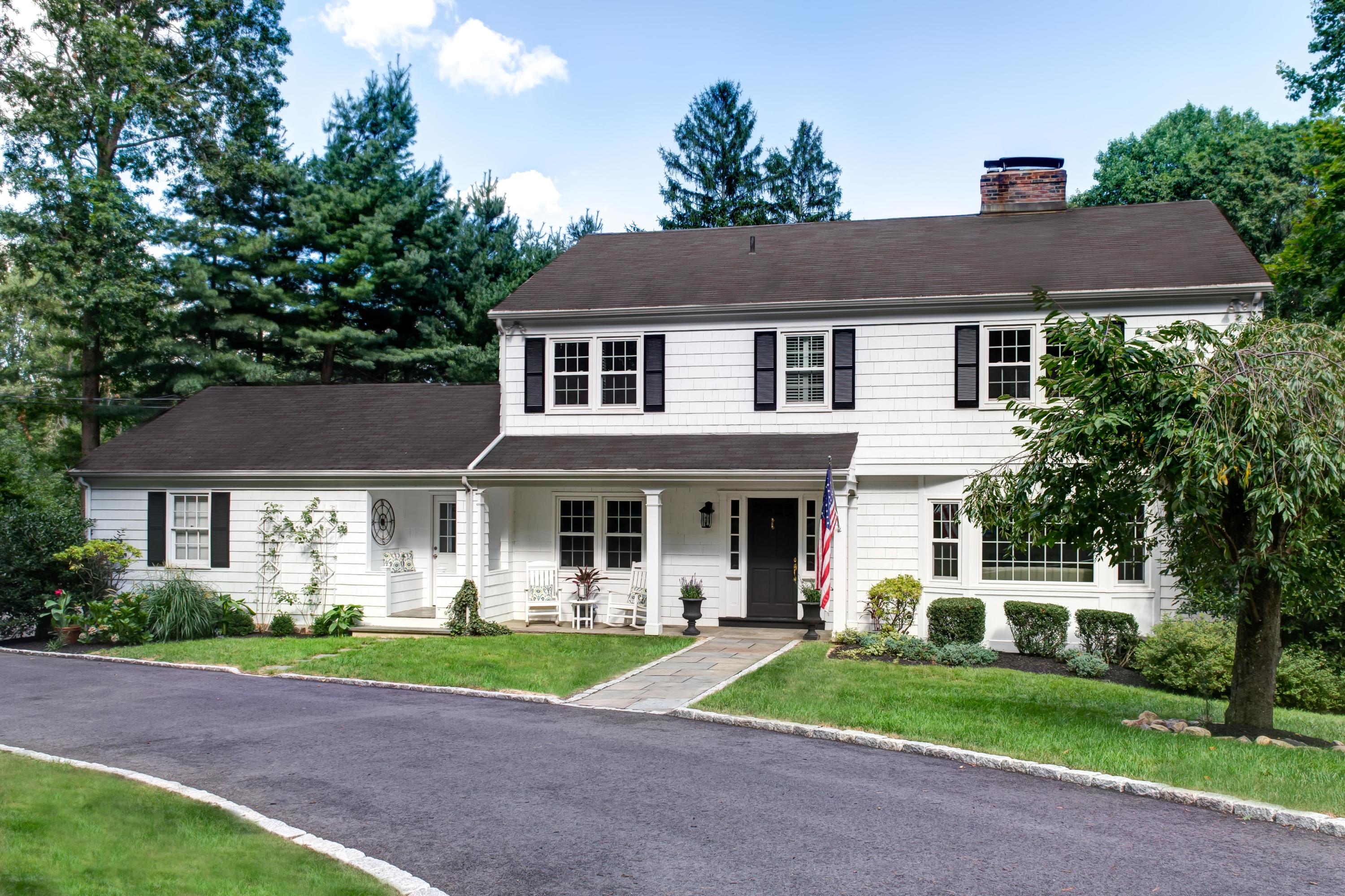 134 Marshall Ridge Road New Canaan, CT 06840 - Photo 2 of 37 a view of a yard in front of a house