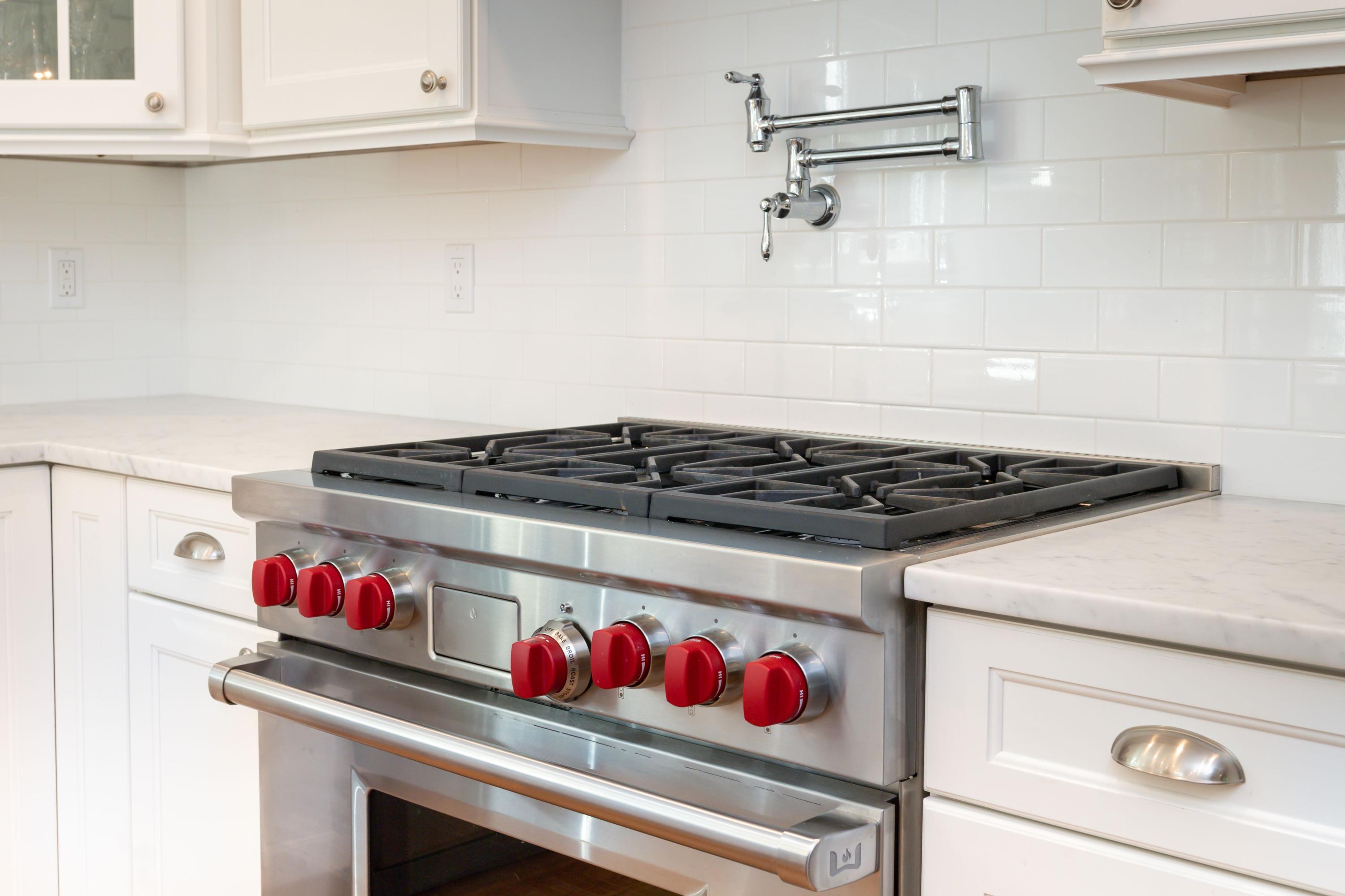 134 Marshall Ridge Road New Canaan, CT 06840 - Photo 12 of 37 a close view of stove and cabinets