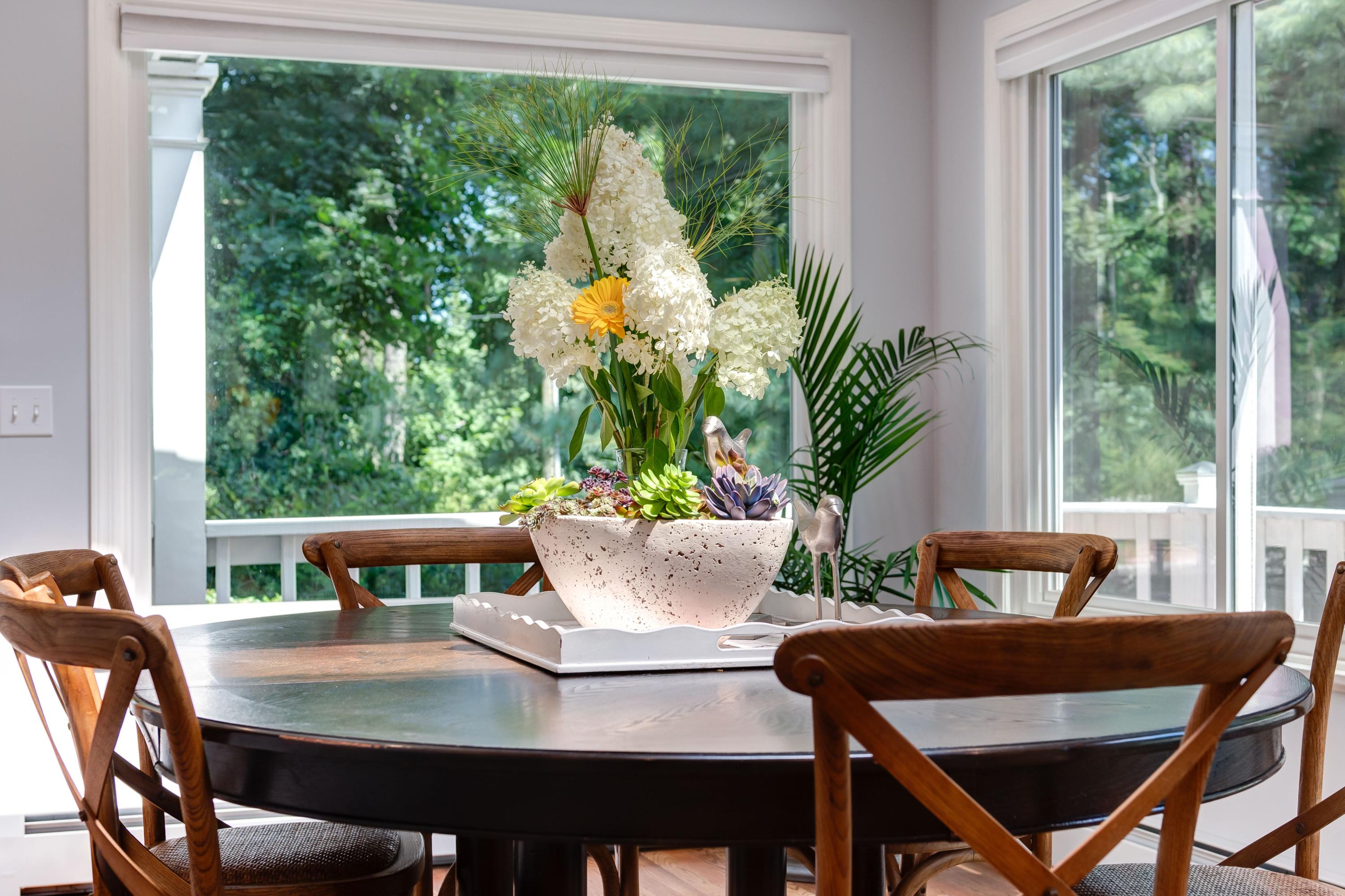134 Marshall Ridge Road New Canaan, CT 06840 - Photo 15 of 37 a view of a dining room with furniture window and outside view