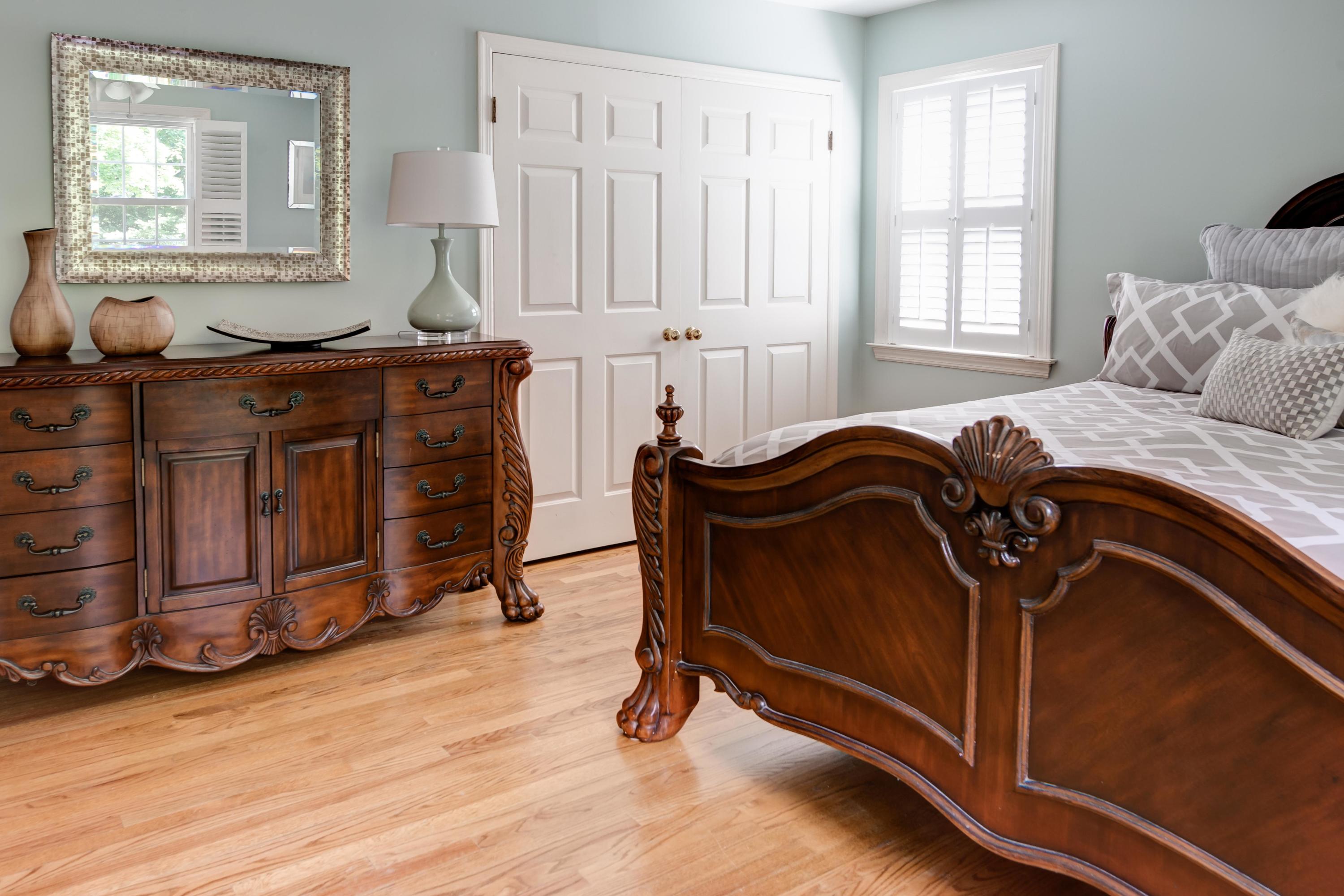 134 Marshall Ridge Road New Canaan, CT 06840 - Photo 19 of 37 a bedroom with a bed and wooden floor
