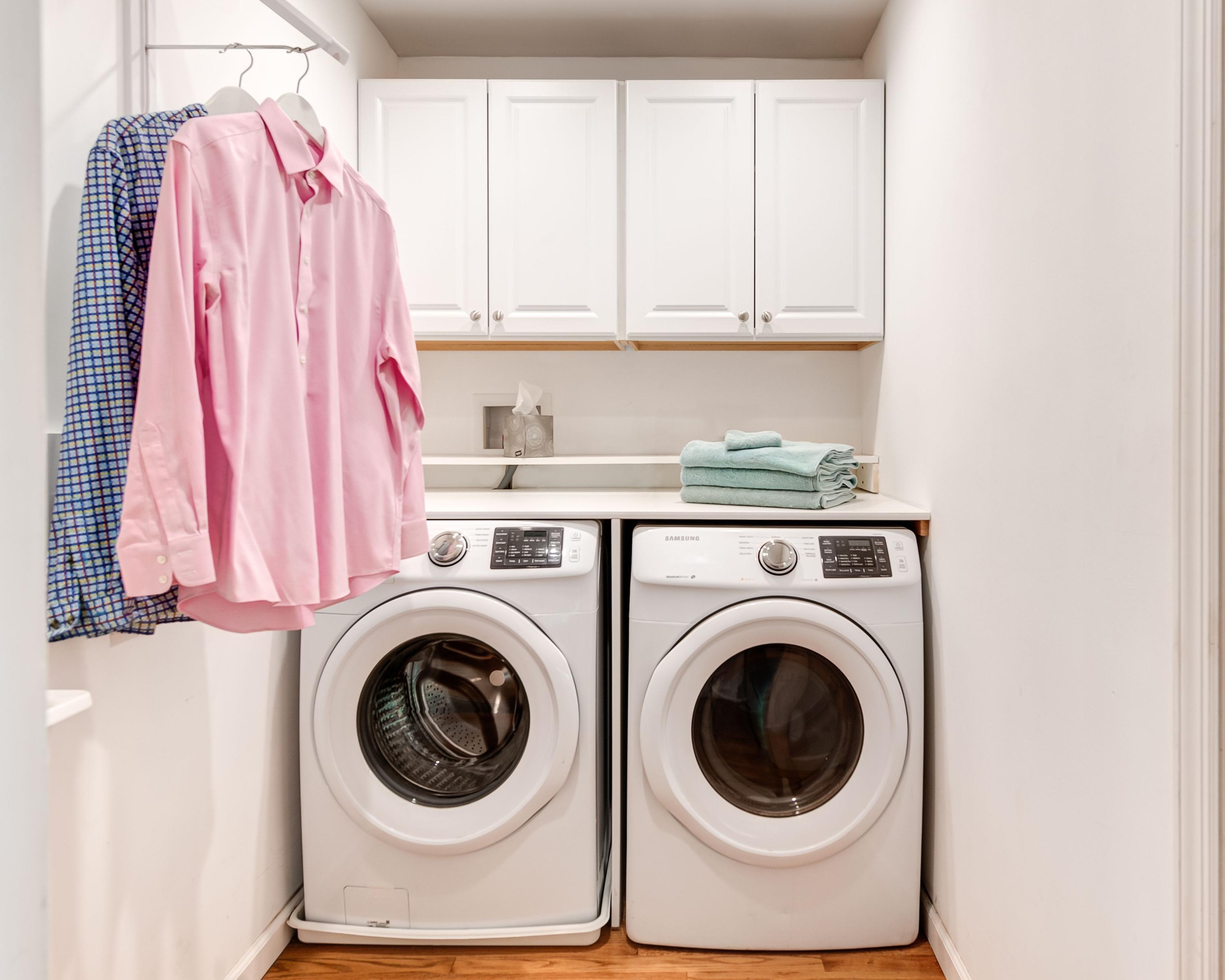 134 Marshall Ridge Road New Canaan, CT 06840 - Photo 26 of 37 a utility room with dryer and washer