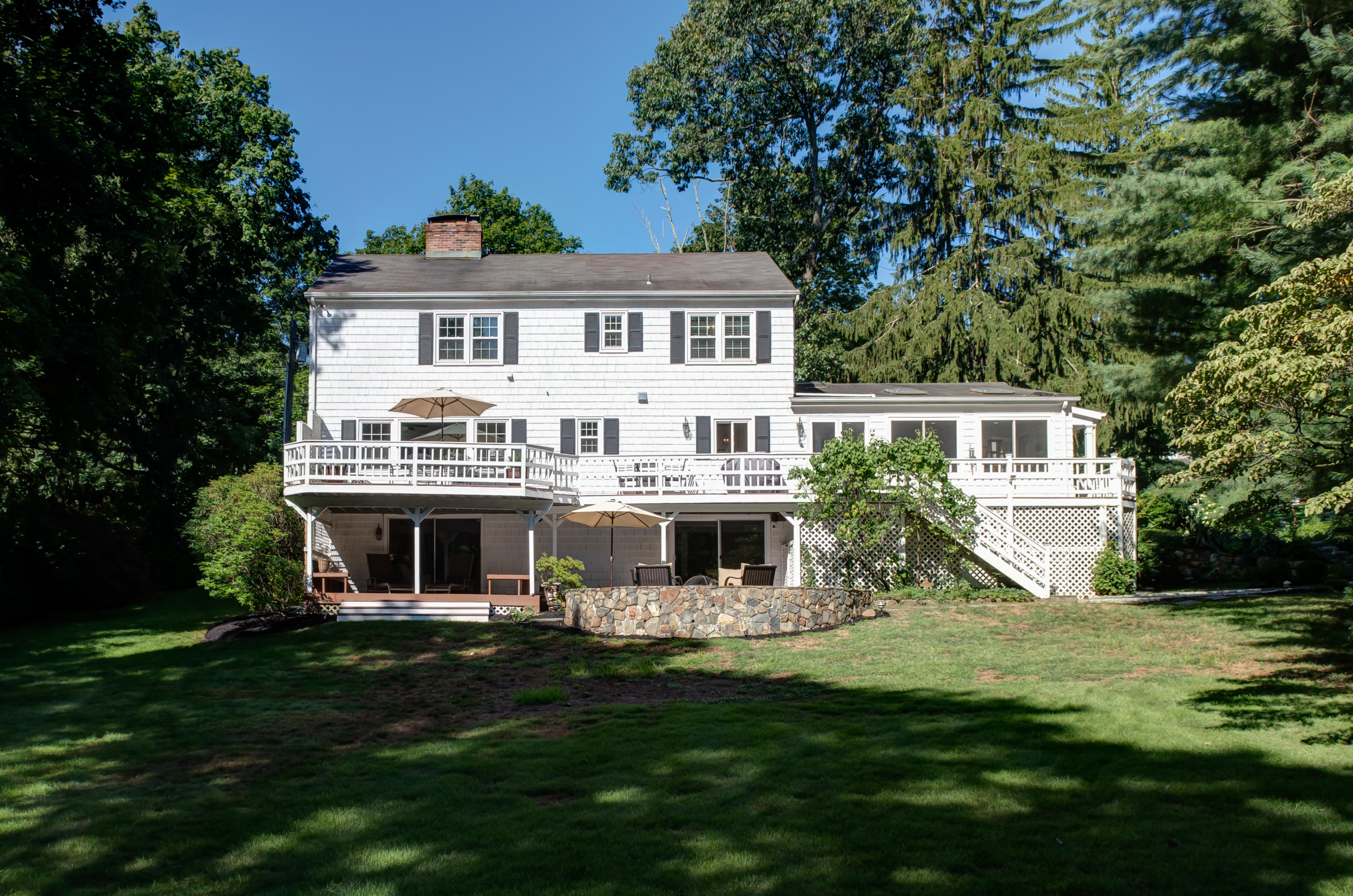 134 Marshall Ridge Road New Canaan, CT 06840 - Photo 37 of 37 a front view of house with yard and green space
