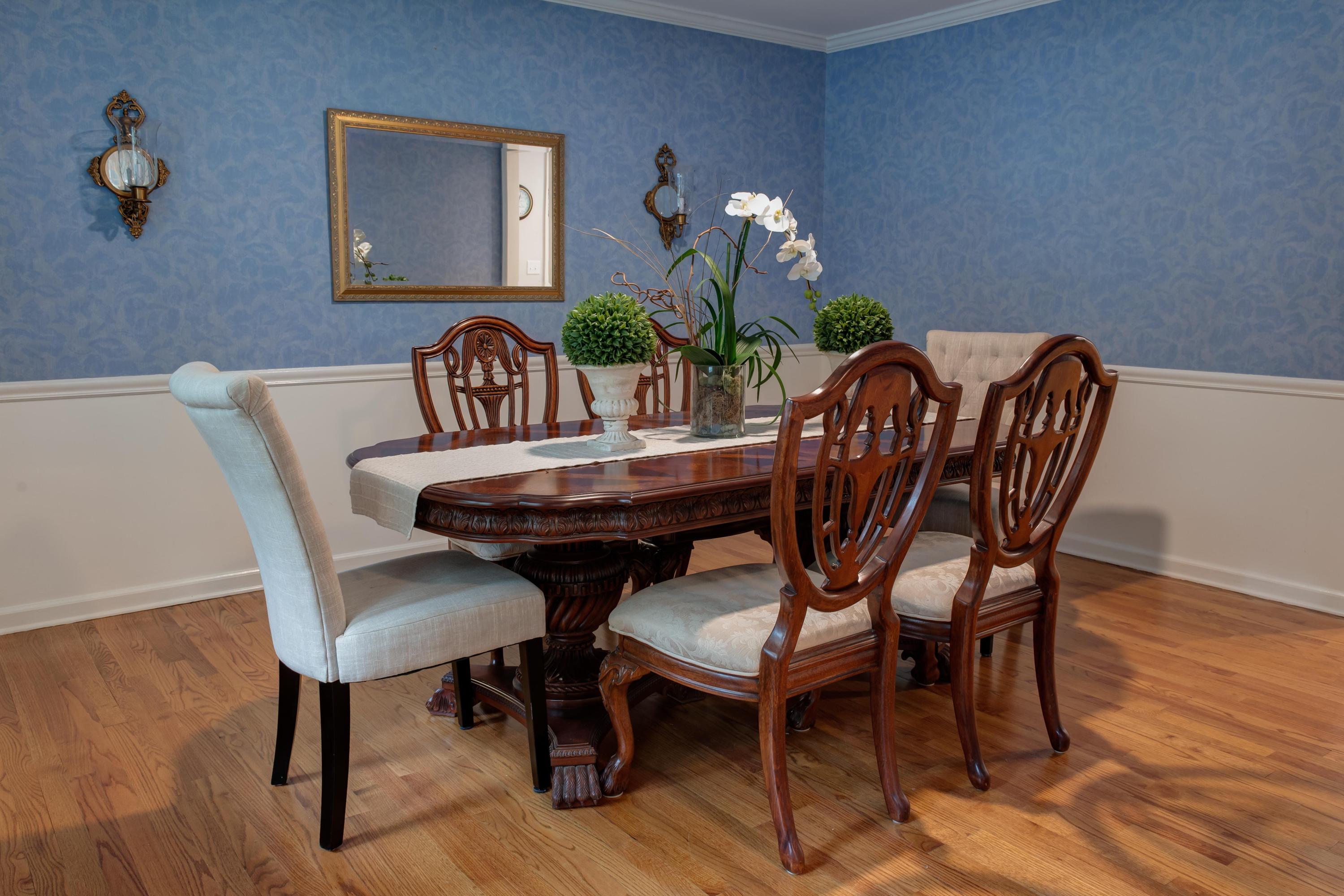 134 Marshall Ridge Road New Canaan, CT 06840 - Photo 8 of 37 a view of a dining room with furniture and wooden floor