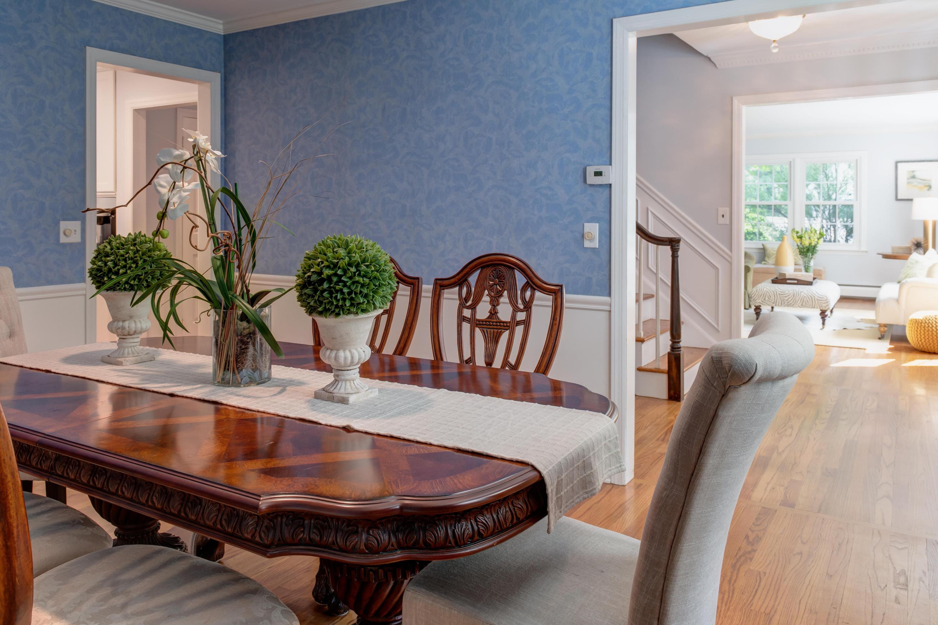 134 Marshall Ridge Road New Canaan, CT 06840 - Photo 9 of 37 a room with table and flowerpot