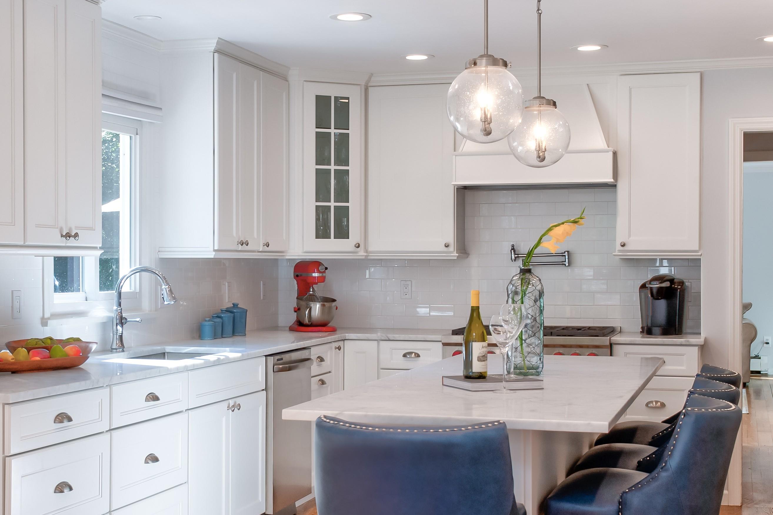 134 Marshall Ridge Road New Canaan, CT 06840 - Photo 10 of 37 a kitchen with cabinets a sink and appliances