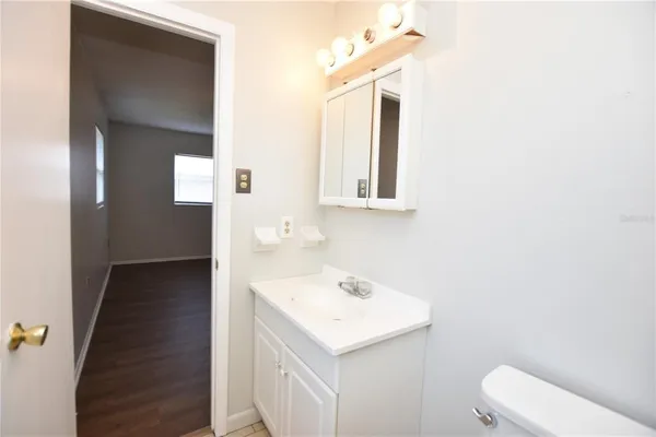 a bathroom with a sink and a toilet