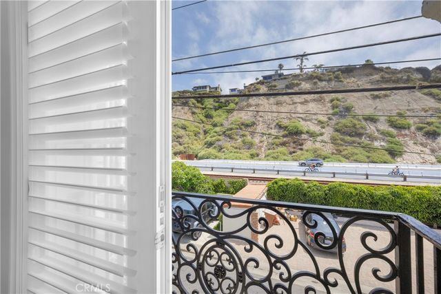 a spacious bathroom with a tub shower and sink