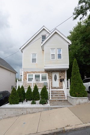 a view of outdoor space yard and front view of a house