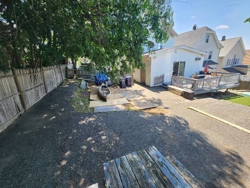 14 Russell Street Everett, MA 02149 - Photo 30 of 32 a view of a house with backyard and sitting area