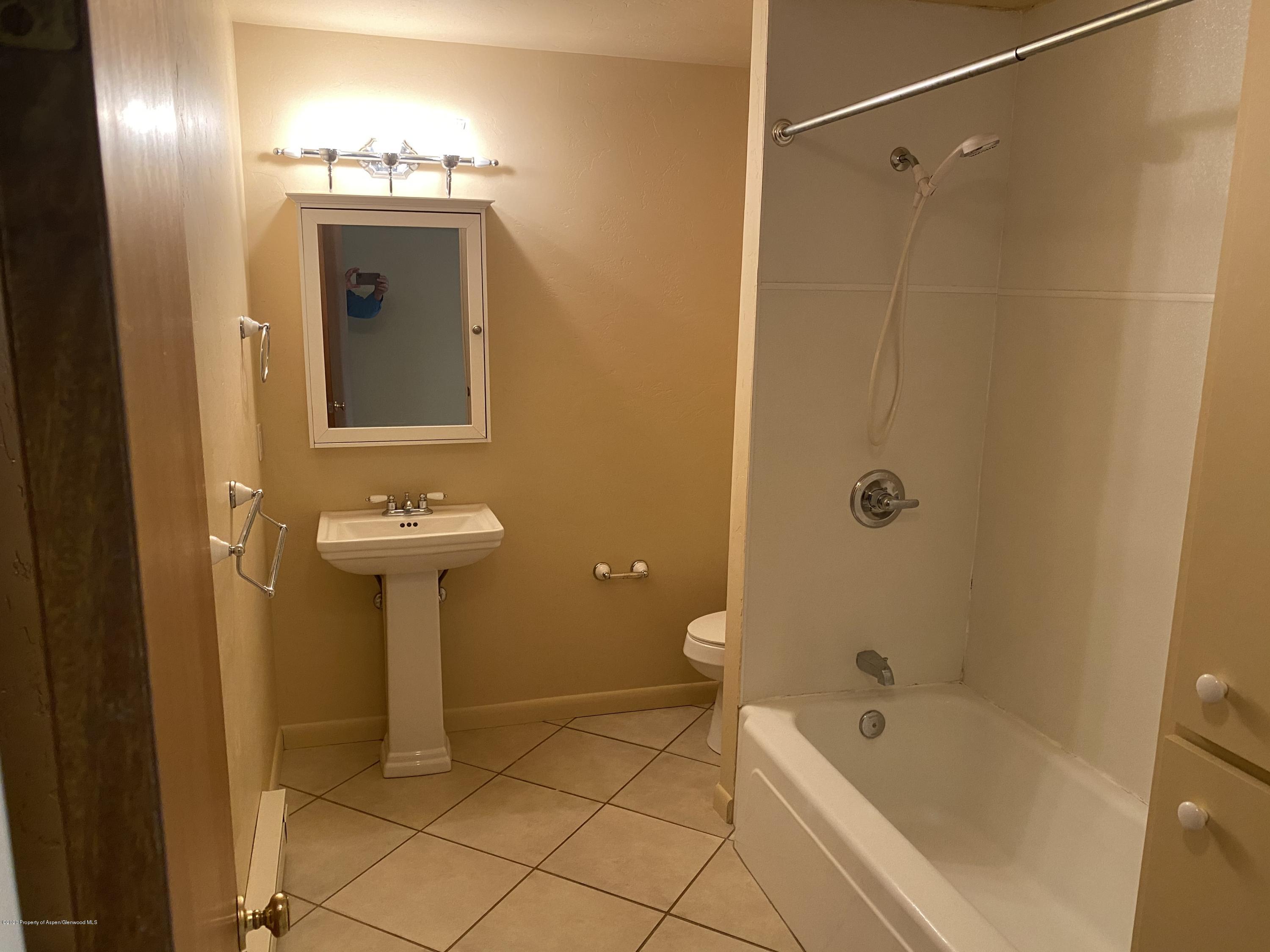 133 County Road 263 Silt, CO 81652 - Photo 9 of 16 a bathroom with a sink a toilet and shower