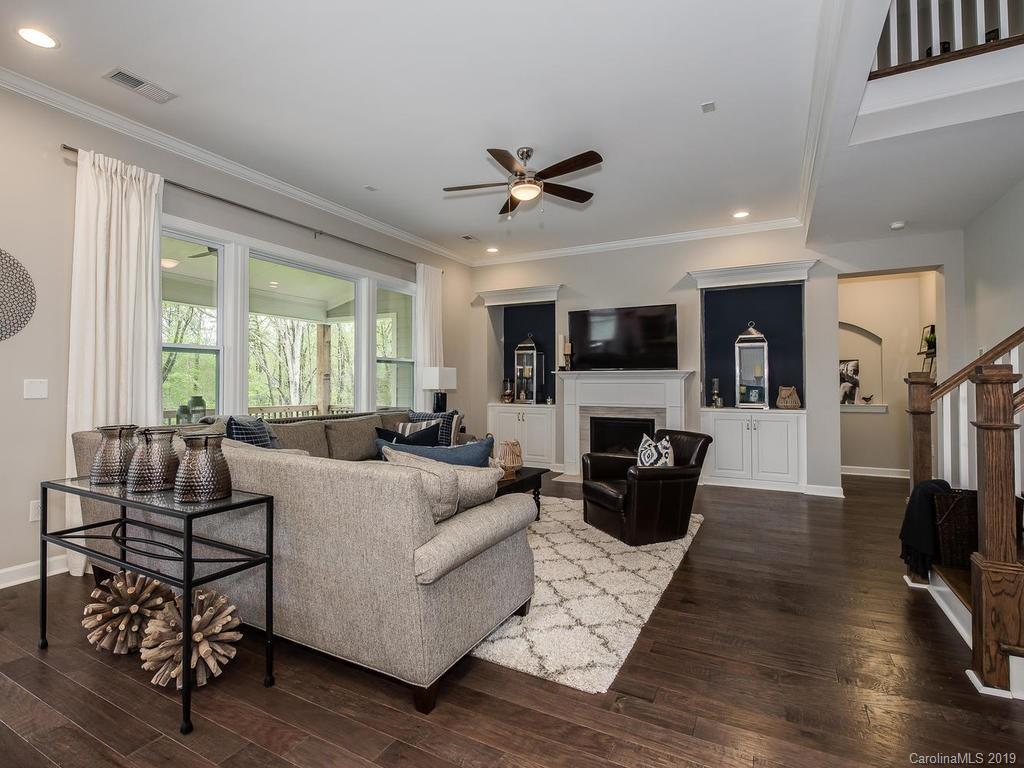 5390 Meadowcroft Way Fort Mill, SC 29708 - Photo 11 of 33 a living room with furniture fireplace and flat screen tv