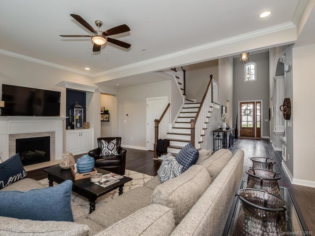 5390 Meadowcroft Way Fort Mill, SC 29708 - Photo 12 of 33 a living room with furniture and a fireplace
