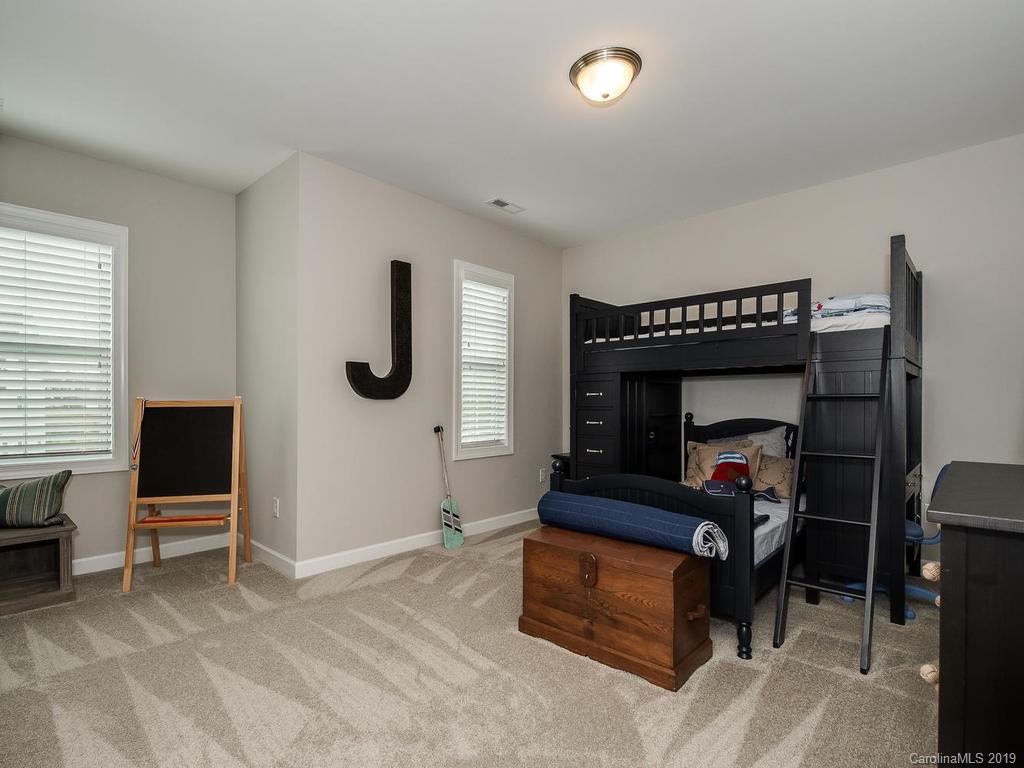 5390 Meadowcroft Way Fort Mill, SC 29708 - Photo 19 of 33 a bedroom with furniture and a bed