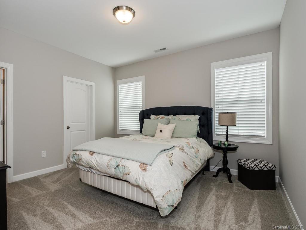 5390 Meadowcroft Way Fort Mill, SC 29708 - Photo 21 of 33 a bedroom with a bed and a window
