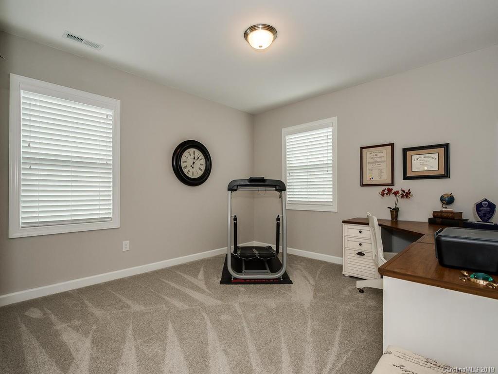 5390 Meadowcroft Way Fort Mill, SC 29708 - Photo 23 of 33 a living room with furniture a window and a table
