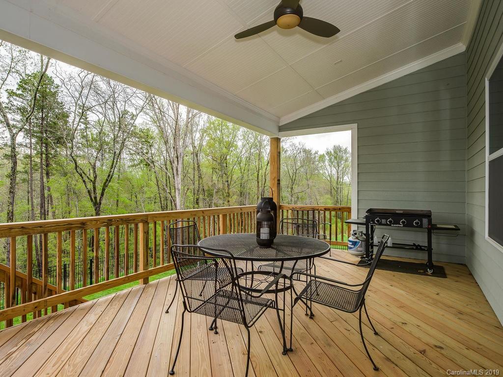 5390 Meadowcroft Way Fort Mill, SC 29708 - Photo 30 of 33 a view of a balcony with chairs and wooden floor