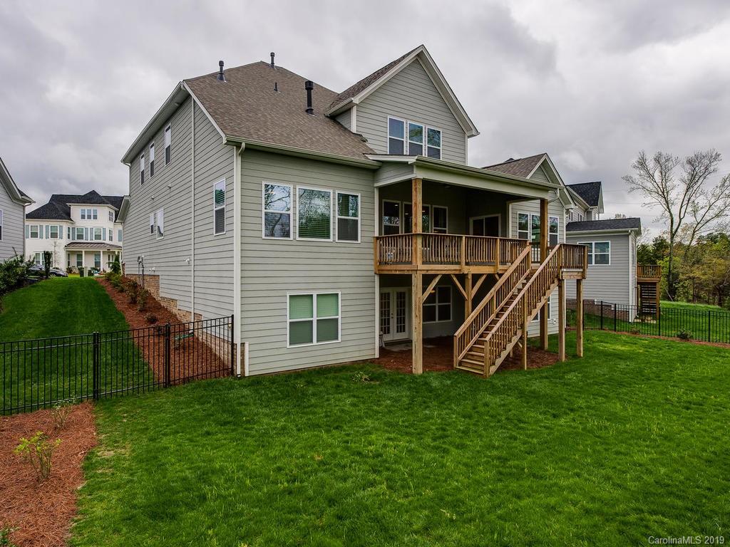 5390 Meadowcroft Way Fort Mill, SC 29708 - Photo 33 of 33 a view of a house with a yard and a wooden deck