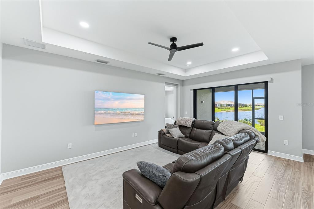 4191 Pegasus Way Naples, FL 34120 - Photo 8 of 48 a living room with furniture and a large window