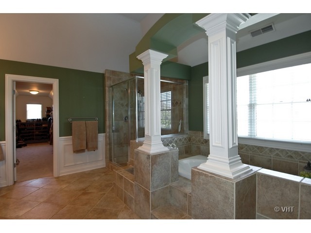 3-n943 Ralph Waldo Emerson Lane St. Charles, IL 60175 - Photo 11 of 24 a living room with furniture and large windows