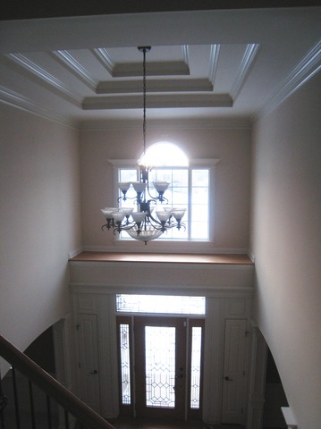 3-n943 Ralph Waldo Emerson Lane St. Charles, IL 60175 - Photo 20 of 24 a view of a hallway with a chandelier