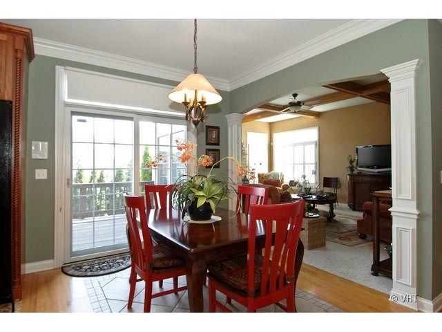 3-n943 Ralph Waldo Emerson Lane St. Charles, IL 60175 - Photo 6 of 24 a view of a dining room with furniture window and outside view