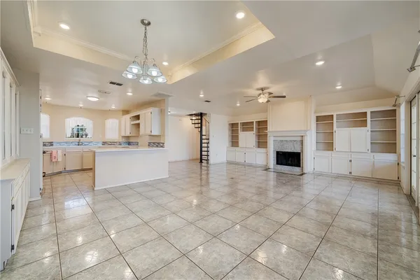 a kitchen with granite countertop cabinets and steel stainless steel appliances