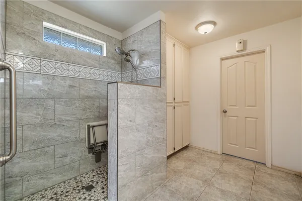 an empty room with a ceiling fan and a ceiling fan