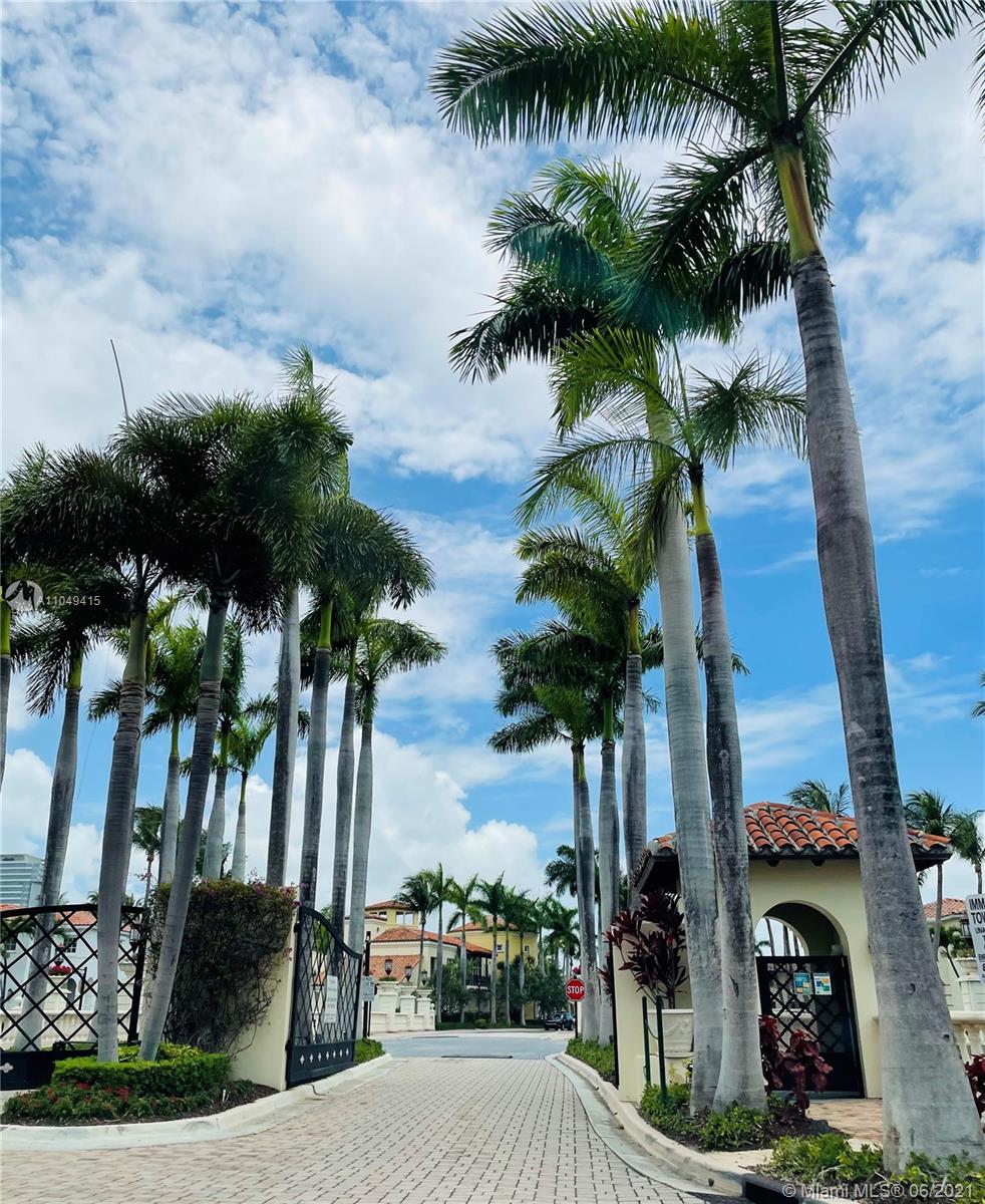 Aventura Aventura, FL 33180 - Photo 1 of 37 a view of a palm tree with flower plants
