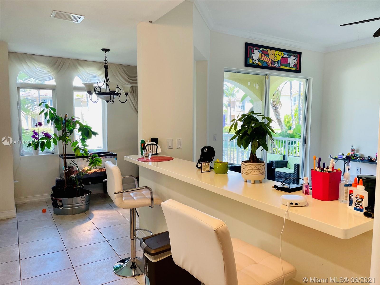 Aventura Aventura, FL 33180 - Photo 14 of 37 a living room with furniture and a potted plant