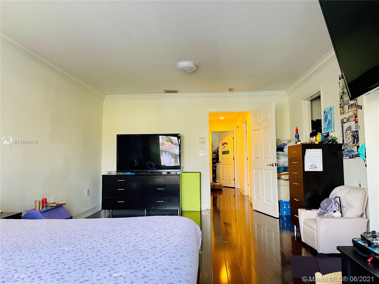 Aventura Aventura, FL 33180 - Photo 17 of 37 a living room with furniture and a flat screen tv