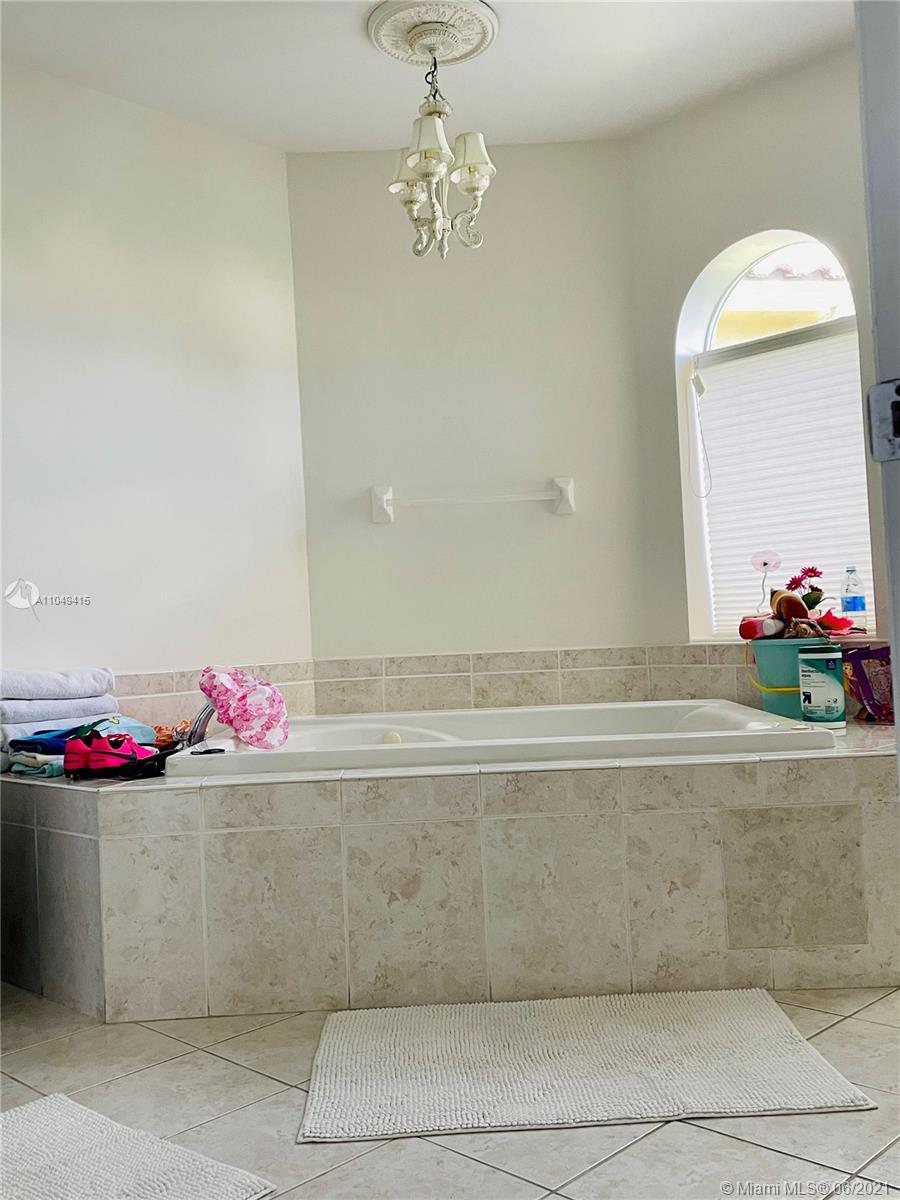 Aventura Aventura, FL 33180 - Photo 22 of 37 a bathroom with a mirror